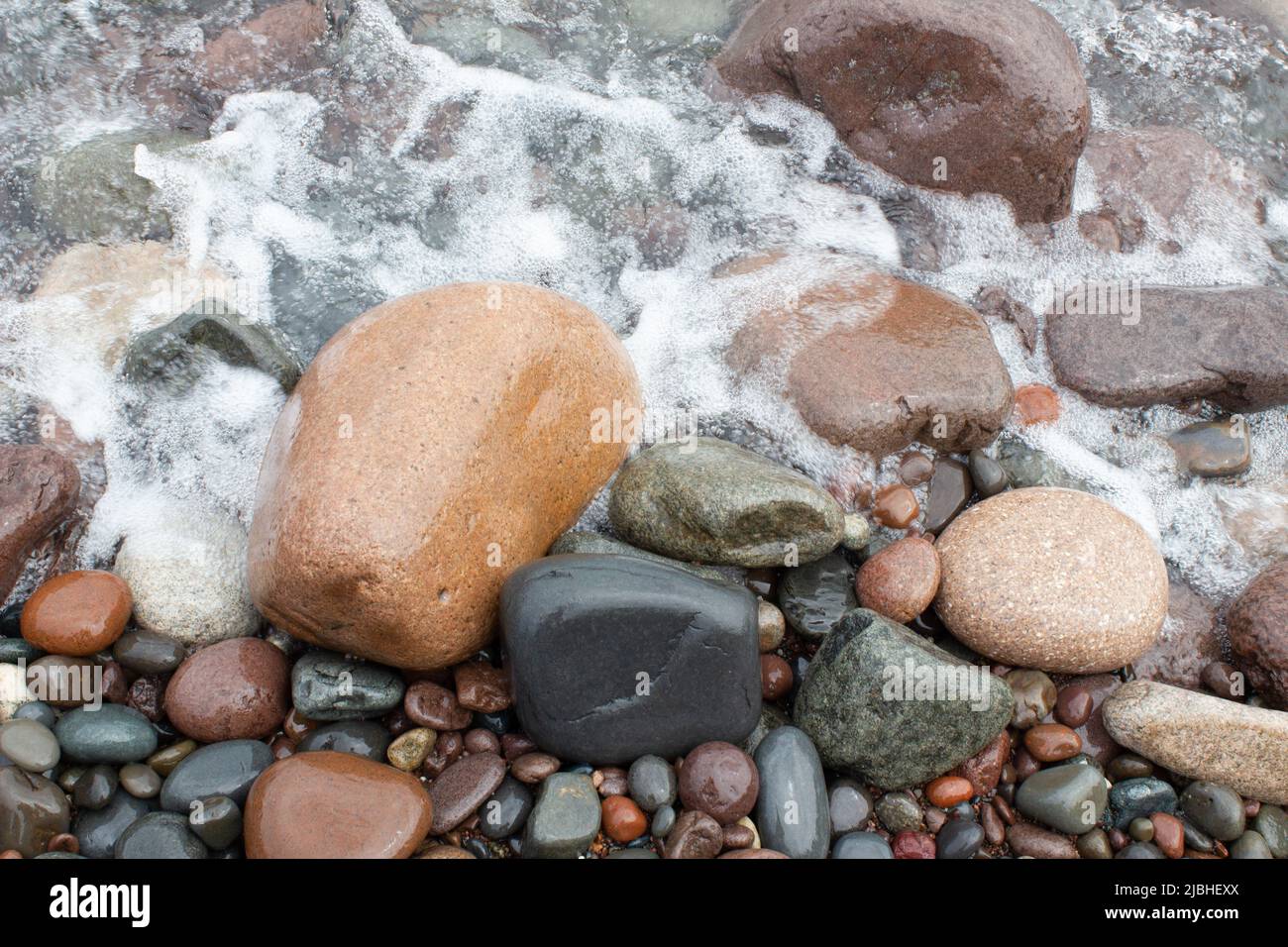 Shore image on Lake Superior in Northern Minnesota Background Rocks water Stock Photo