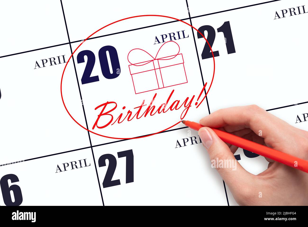 20th day of April. The hand circles the date on the calendar 20 April, draws a gift box and writes the text Birthday. Holiday. Spring month, day of t Stock Photo - Alamy