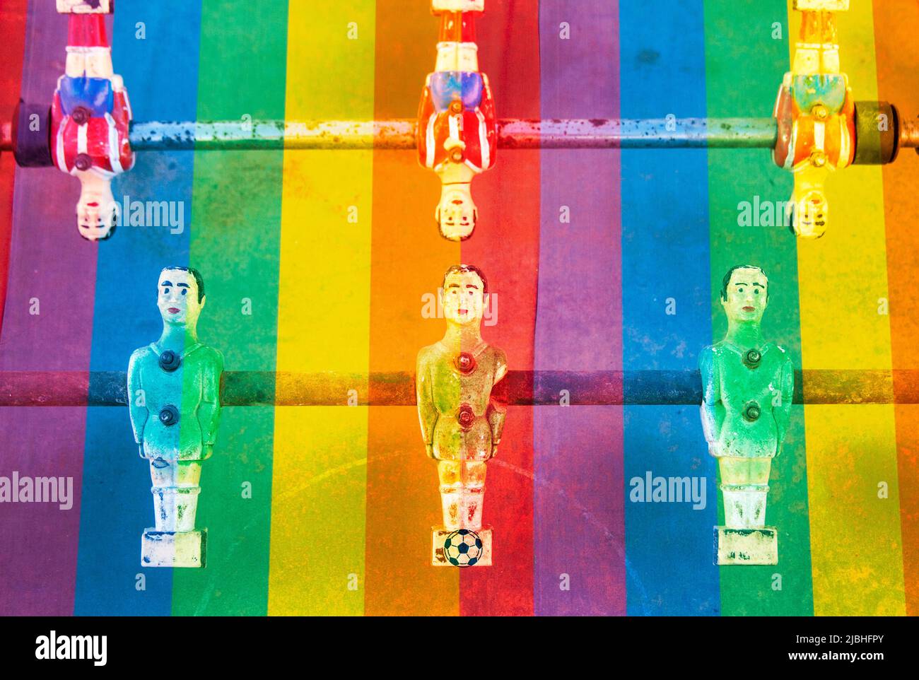 Rainbow flag and table football game composite, LGTB, gay footballer, sport, coming out... concept Stock Photo