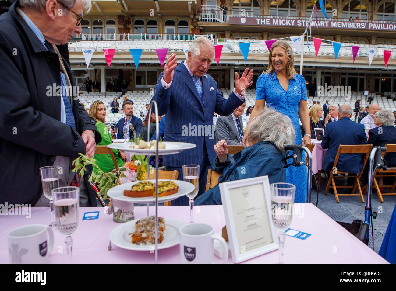 The Prince of Wales meets guests at the Big Lunch on the cricket pitch at the Oval, South London.  In celebration of Her Majesty The Queen’s Platinum Stock Photo