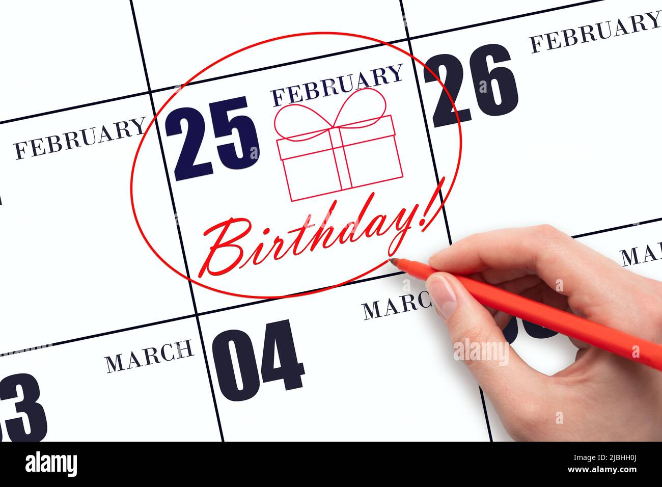 25th day of February. The hand circles the date on the calendar 25 February,  draws a gift box and writes the text Birthday. Holiday. Winter month, day  Stock Photo - Alamy