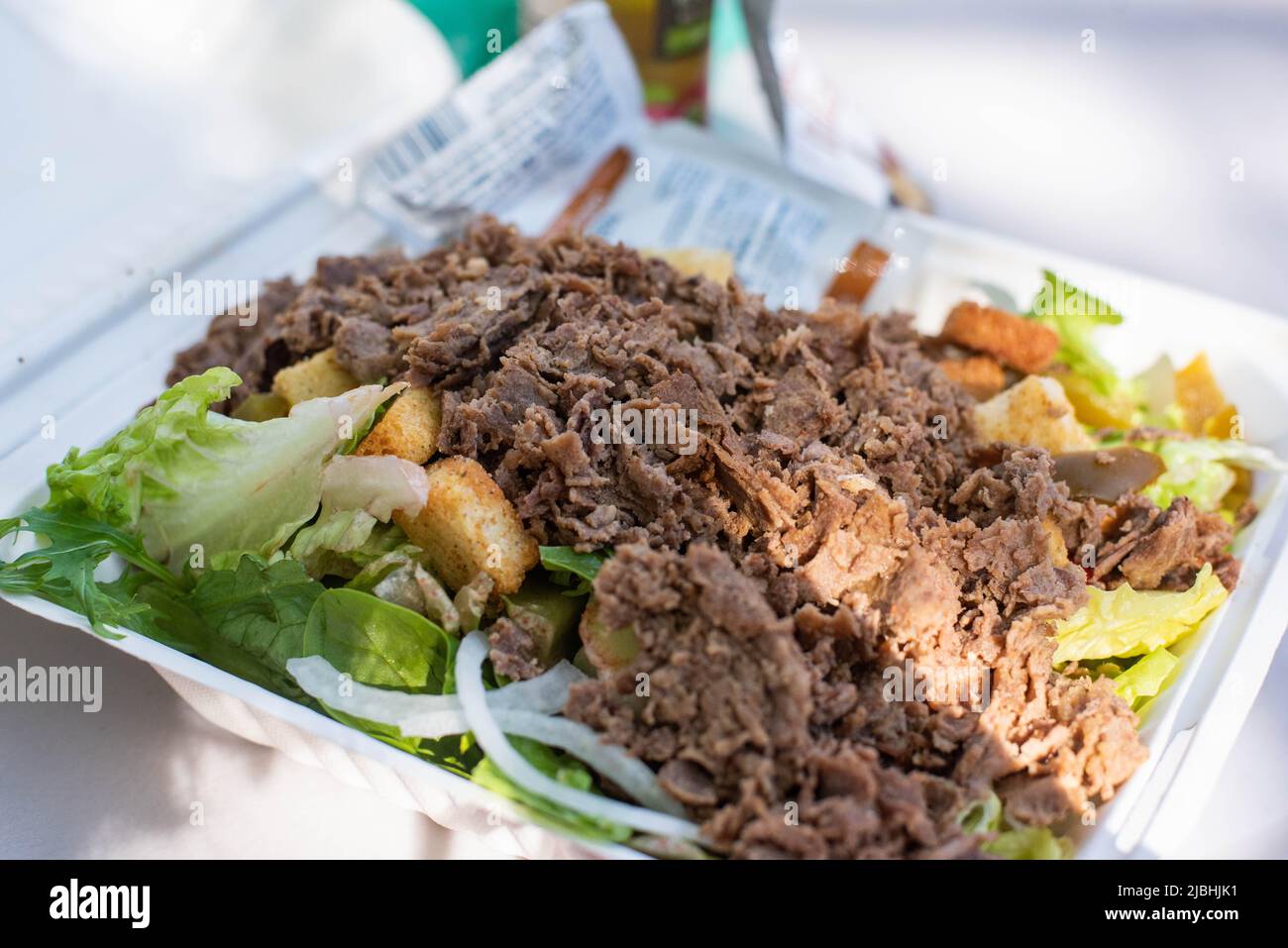 A cheesesteak salad with croutons. Stock Photo