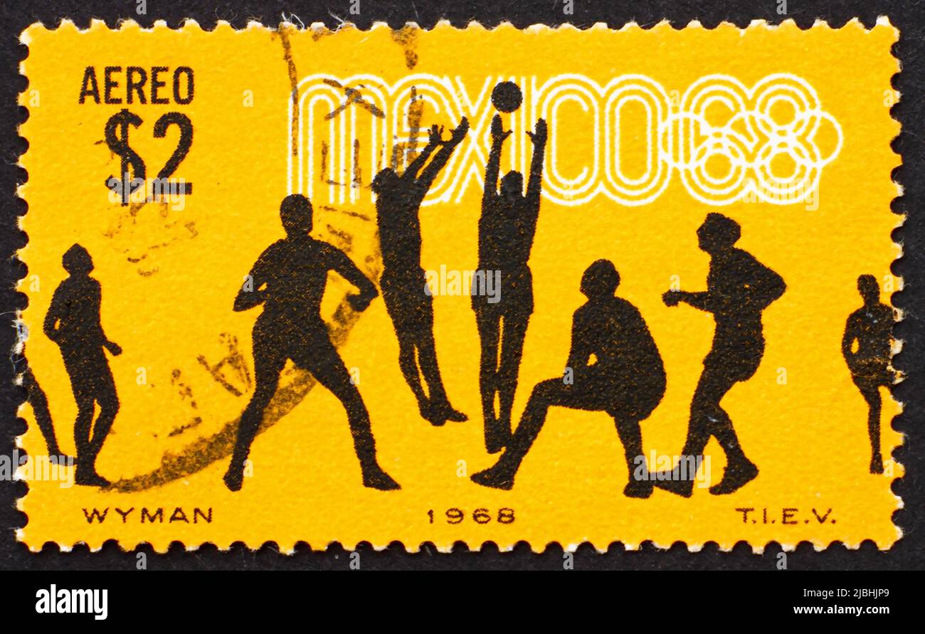 MEXICO - CIRCA 1968: a stamp printed in the Mexico shows Volleyball, 19th Olympic Games, Mexico City 68, circa 1968 Stock Photo