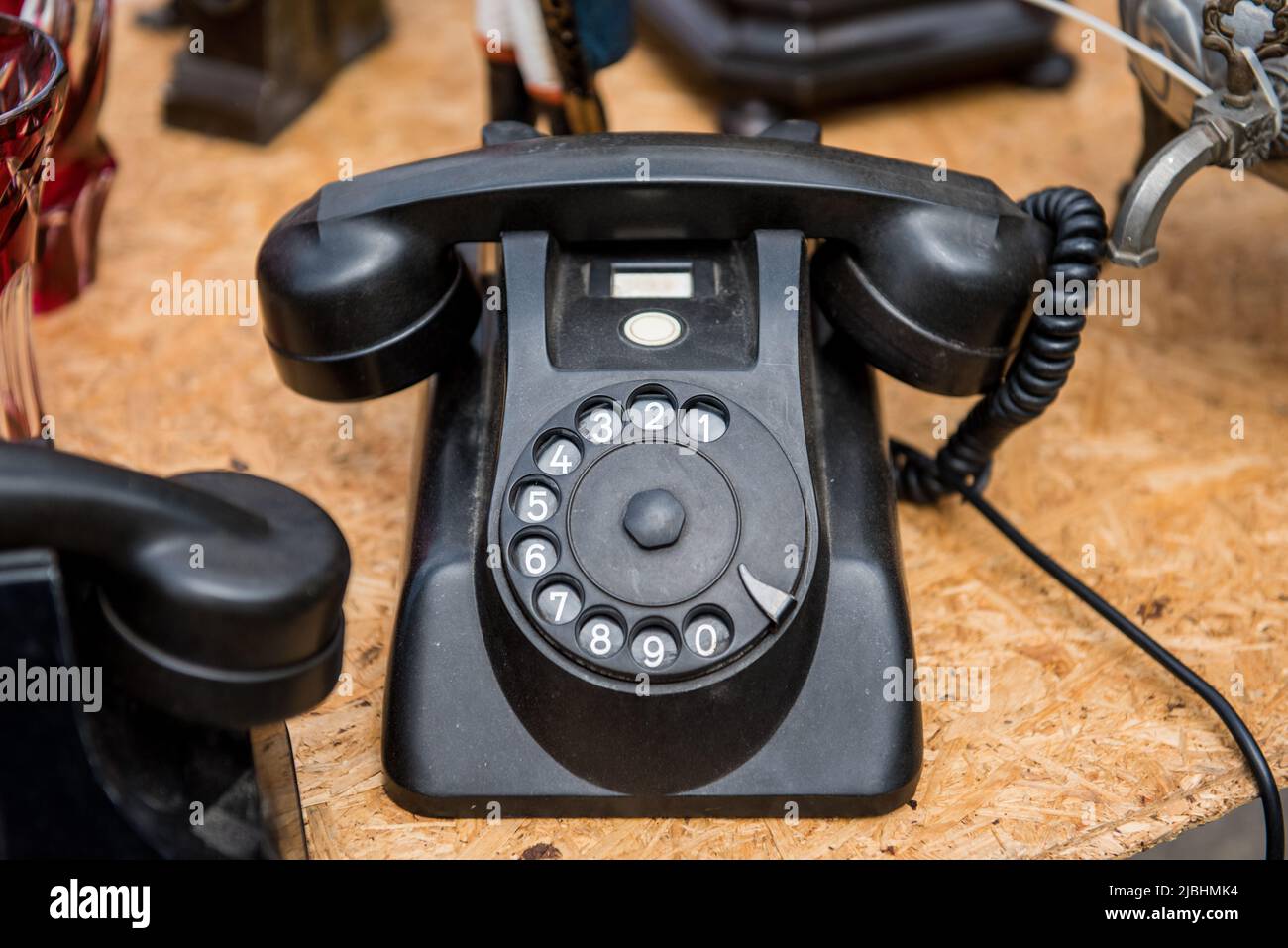 Retro old black telephone on the table Stock Photo Alamy