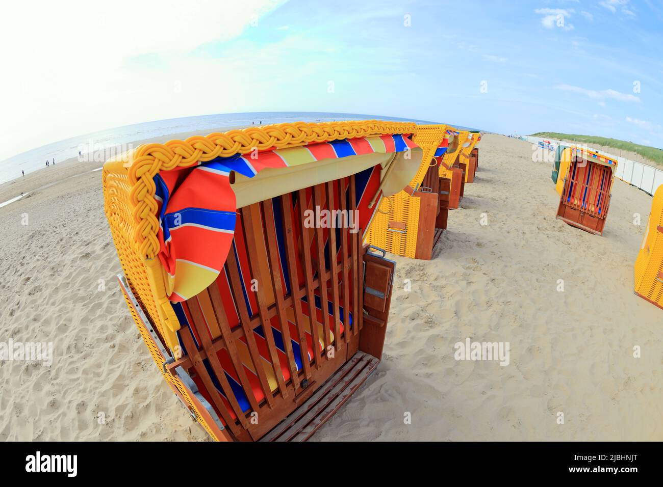 Roofed wicker beach chairs. Egmond aan Zee, North Sea, the Netherlands. Stock Photo