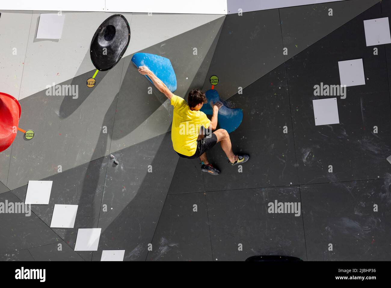 Climbing. Sport. Young person climbing in Block Climbing. Olympic