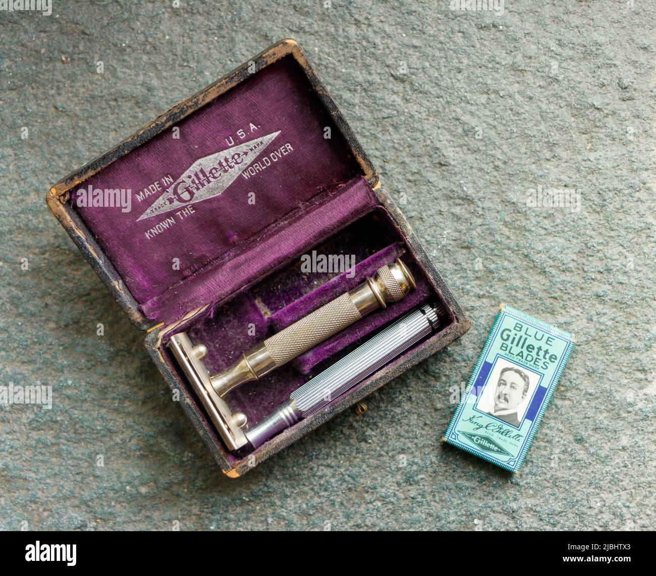 vintage Gillette safety razor in purple velvet lined case with spare blades and handle made in USA Stock Photo