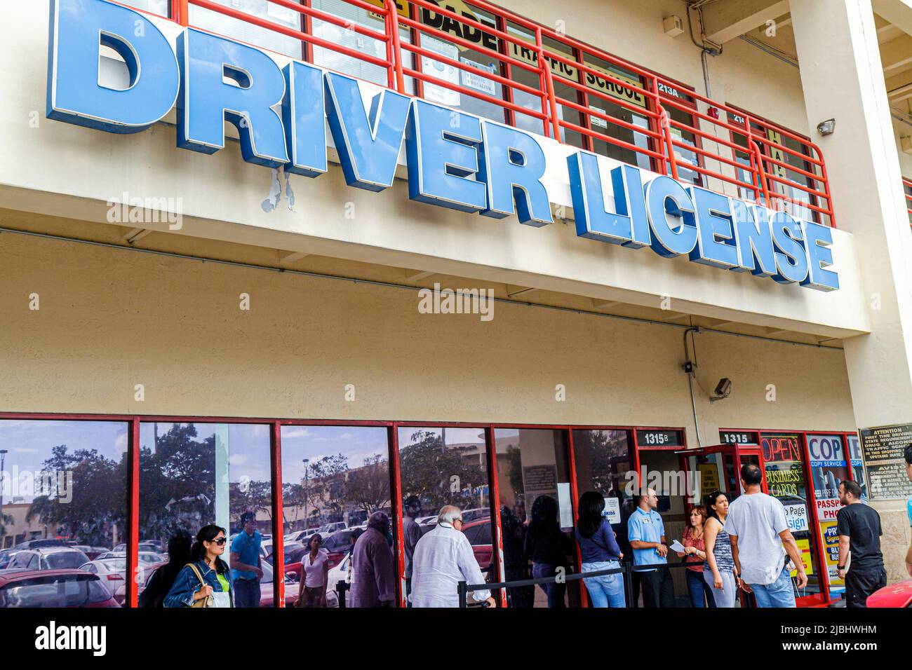 Miami Florida,Department of Highway Safety & Motor Vehicles,Driver License Service Center,centre renewal Hispanic men women outside exterior entrance Stock Photo