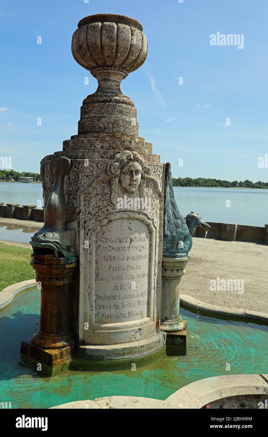 Historic water fountain at Heroja Park next to Lake Palic in Vojvodina Stock Photo