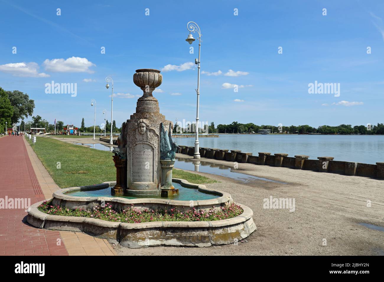 Historic water fountain at Heroja Park next to Lake Palic in Vojvodina Stock Photo