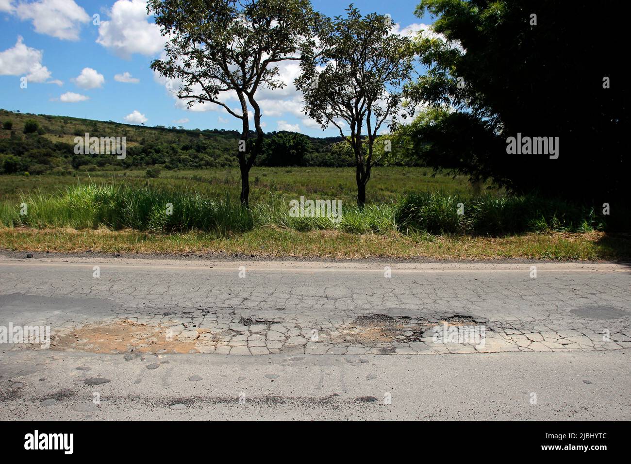 highway roof with defective and spoiled asphalt, dangerous for traffic Stock Photo