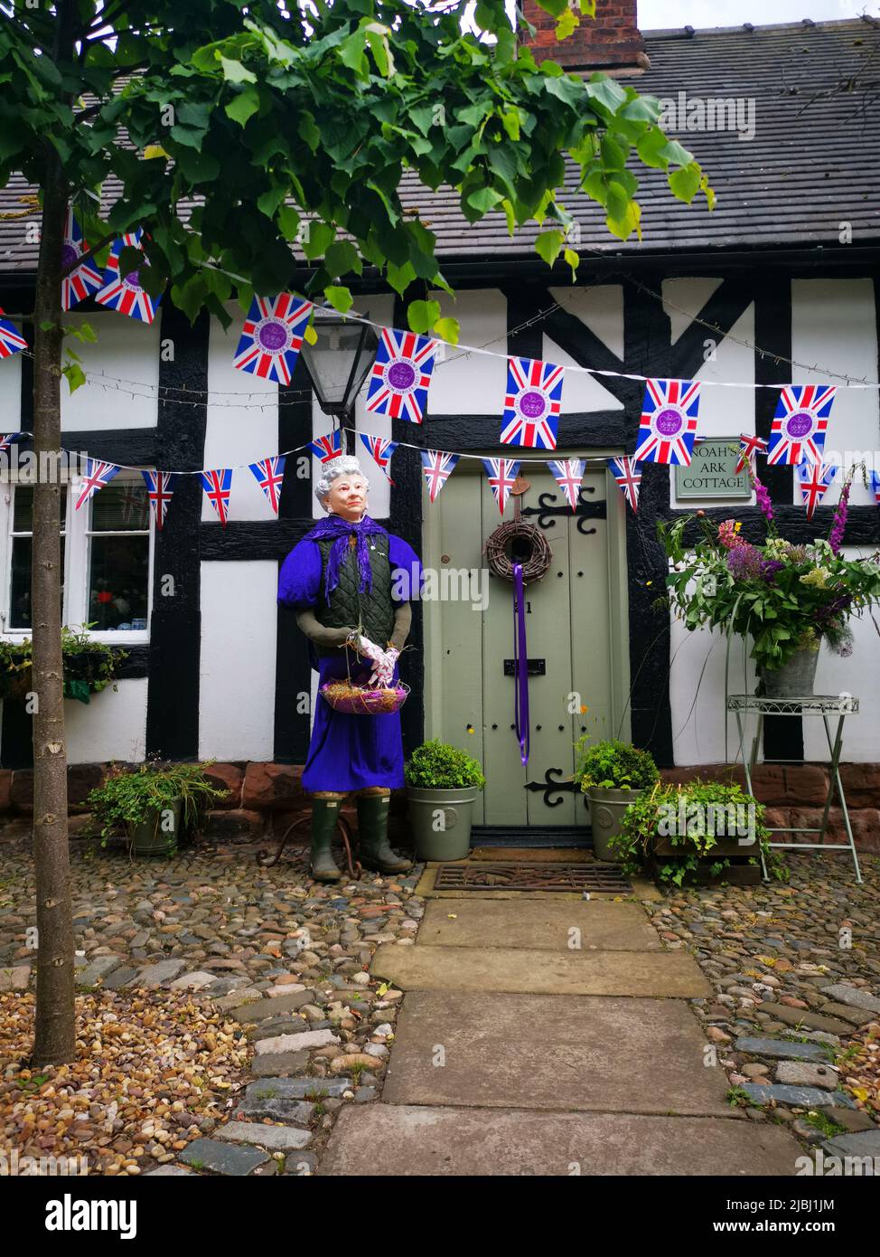 A queen decoration in the village of Great Budworth, Chershire during the platinum jubilee. Stock Photo