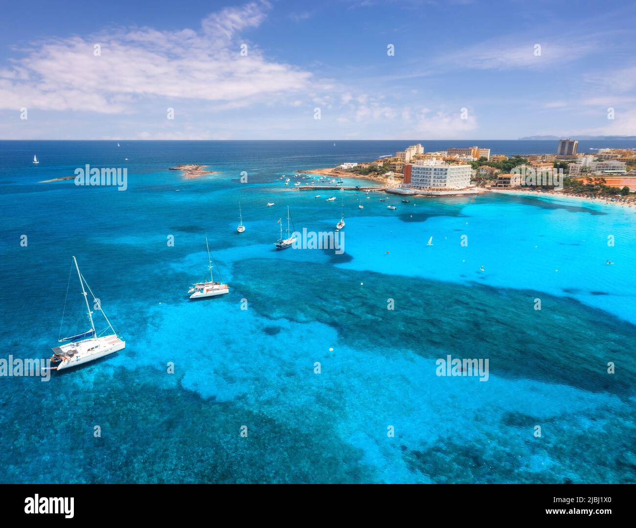 Aerial view of boats and luxury yachts in the sea at sunset Stock Photo ...