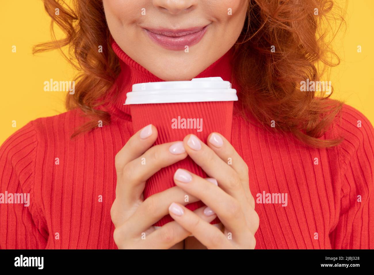 cropped view of takeaway coffee cup in hands Stock Photo