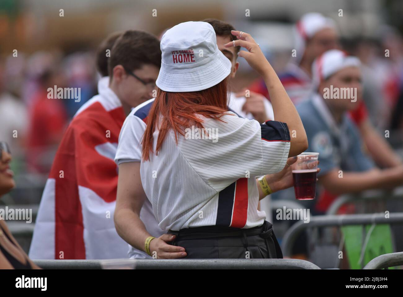 Supporters at the 4TheFans Fanzone in Manchester watch the Euro 2020