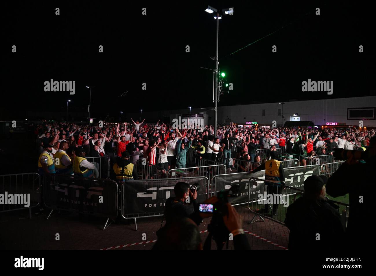 Supporters at the 4TheFans Fanzone in Manchester watch the Euro 2020