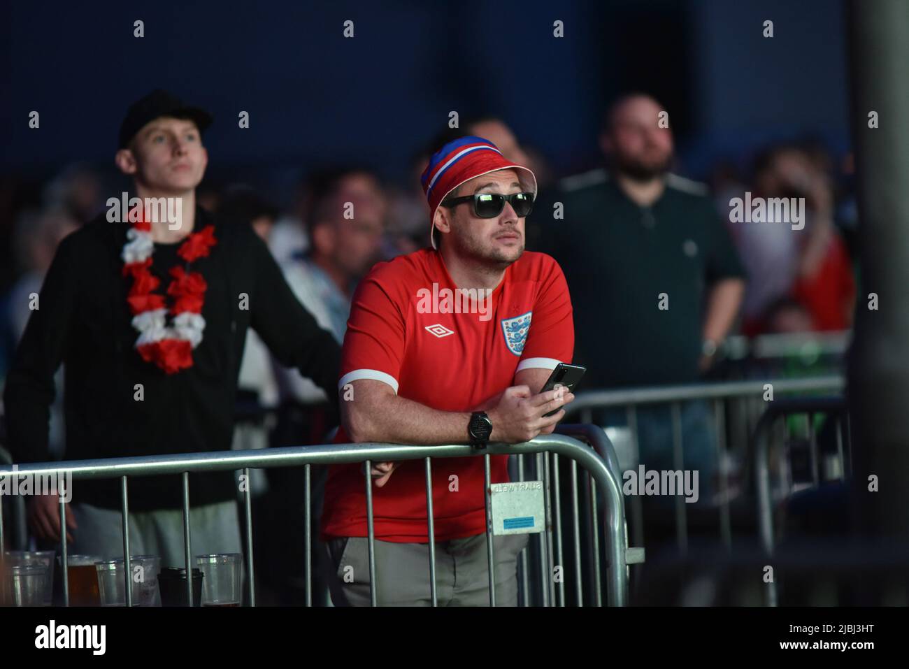 Supporters at the 4TheFans Fanzone in Manchester watch the Euro 2020