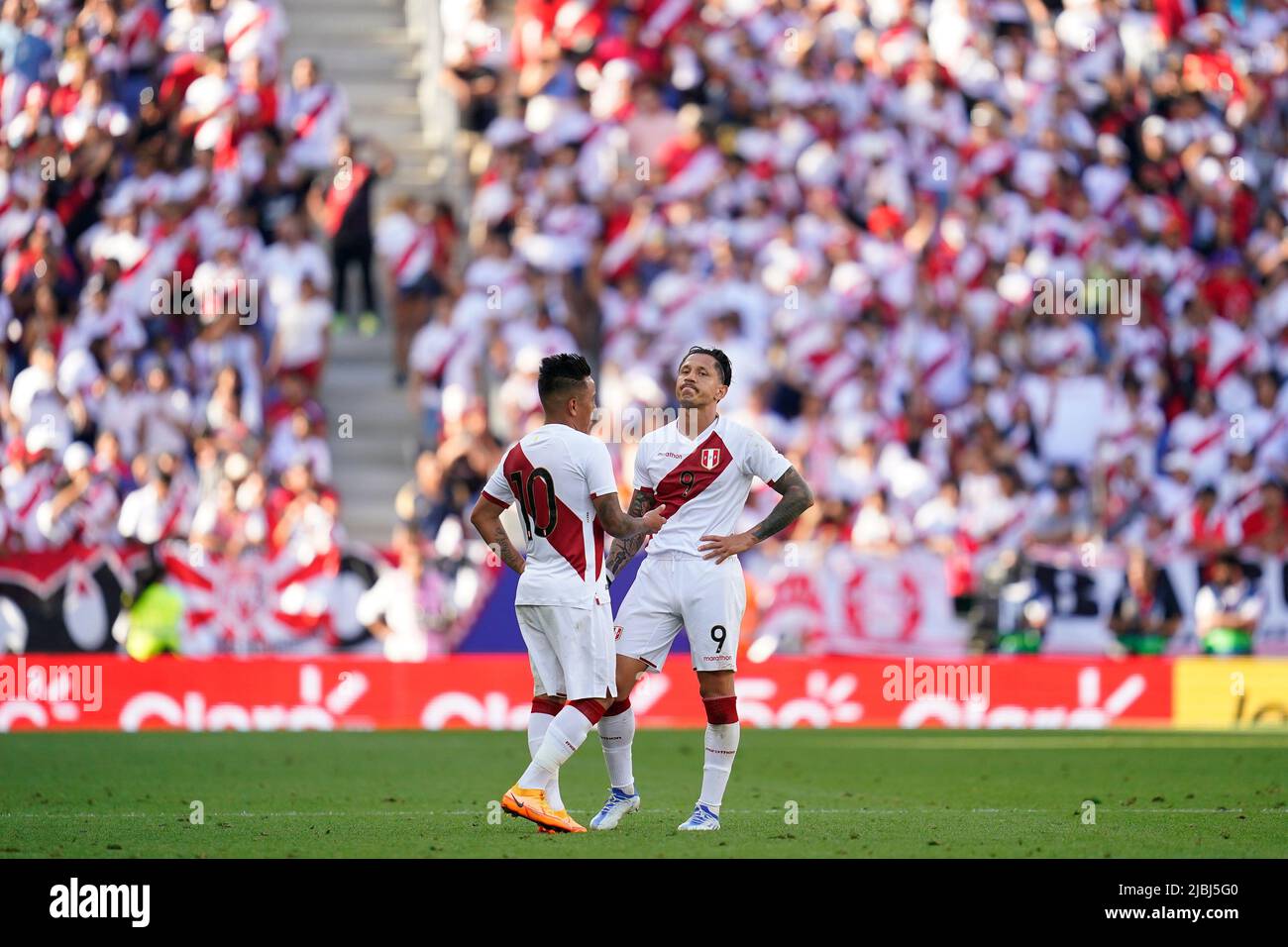 Christian Cueva and Gianluca Lapadula of Peru during the friendly match between Peru and New Zealand played at RCDE Stadium on June 5, 2022 in Barcelona, Spain. (Photo by Bagu Blanco / PRESSINPHOTO) Stock Photo