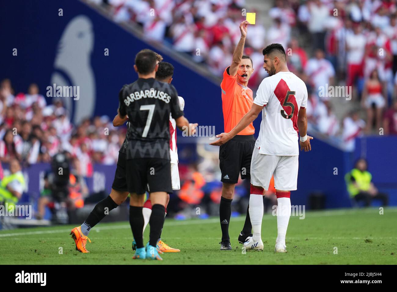 Carlos Zambrano of Peru receives yellow card during the friendly match between Peru and New Zealand played at RCDE Stadium on June 5, 2022 in Barcelona, Spain. (Photo by Bagu Blanco / PRESSINPHOTO) Stock Photo