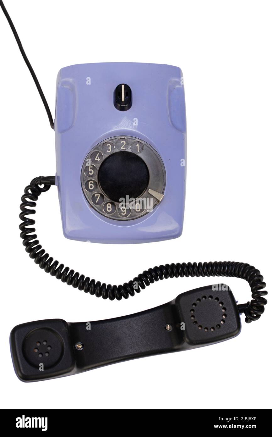 vintage retro violet rotary telephone isolated on white background Stock Photo