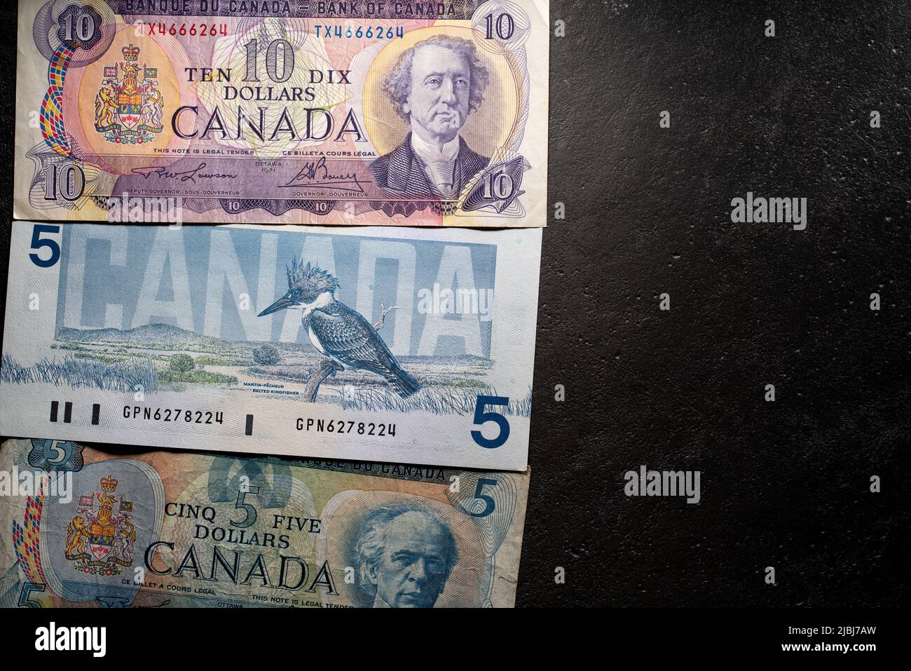 Toronto, Canada - October 30. 2021: Canadian Dollar Banknotes, ten and five Dollar bills. Old bills from Canada. Stock Photo