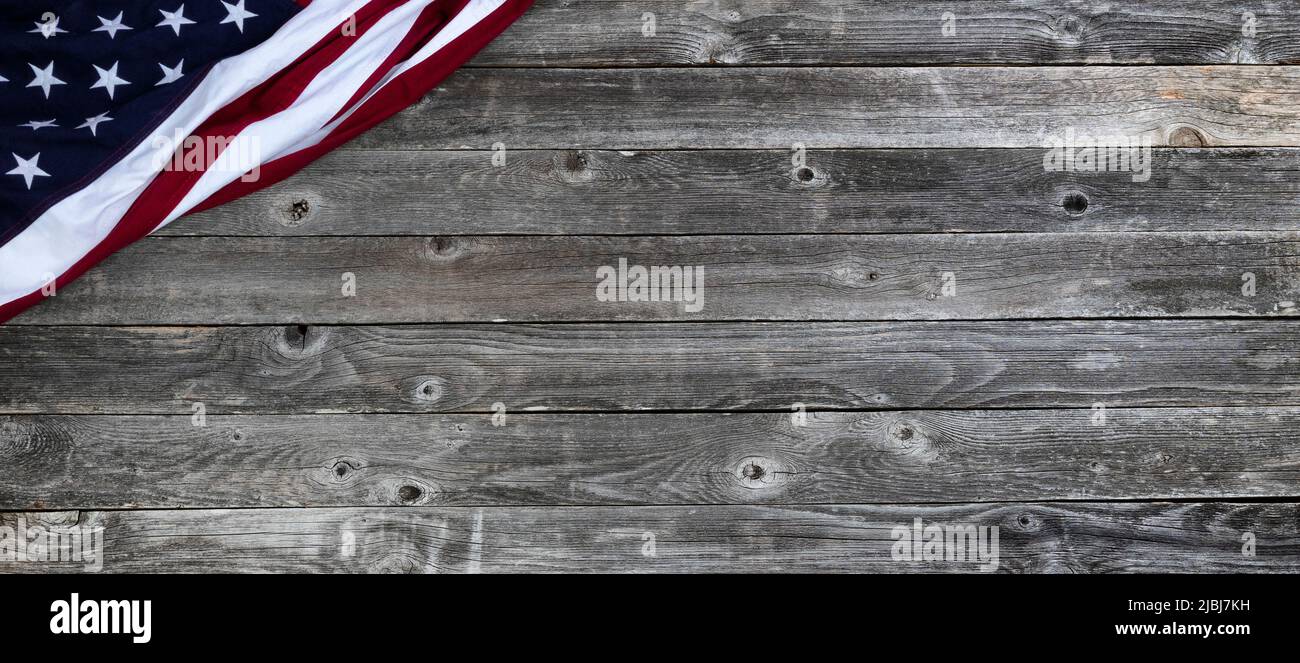 American flag on rustic wooden planks for 4th of July, labor, veteran, Memorial or Independence Day holiday celebration background within United State Stock Photo