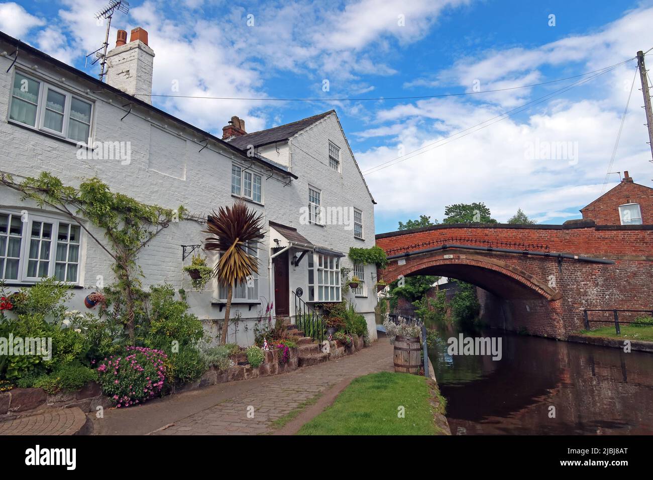 Bridgewater House & Canal, bridge,  Lymm Village centre, Warrington, Cheshire, England, UK, WA13 0HU Stock Photo