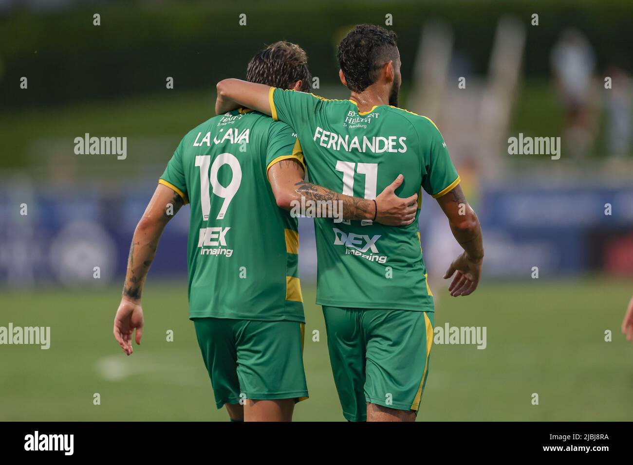 St. Petersburg, FL: Tampa Bay Rowdies forward Jake LaCava (19) puts his arm around  midfielder Leo Fernandes (11) scoring the only goal of the game af Stock Photo
