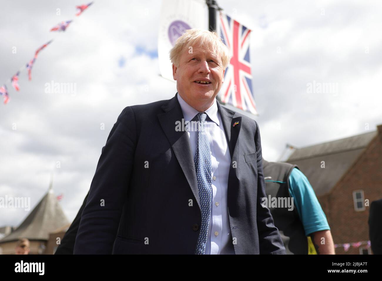 (220607) -- LONDON, June 7, 2022 (Xinhua) -- British Prime Minister Boris Johnson visits Darlington town centre in Britain, May 27, 2022. Boris Johnson on Monday won a no-confidence vote among Conservative lawmakers, saving his precarious premiership. Johnson won the support of 211 out of 359 lawmakers, dozens more than the threshold of 180 votes, according to the result announced by Graham Brady, chairman of the Conservative Party's parliamentary group, the 1922 Committee. (Andrew Parsons/No. 10 Downing Street/Handout via Xinhua) Stock Photo