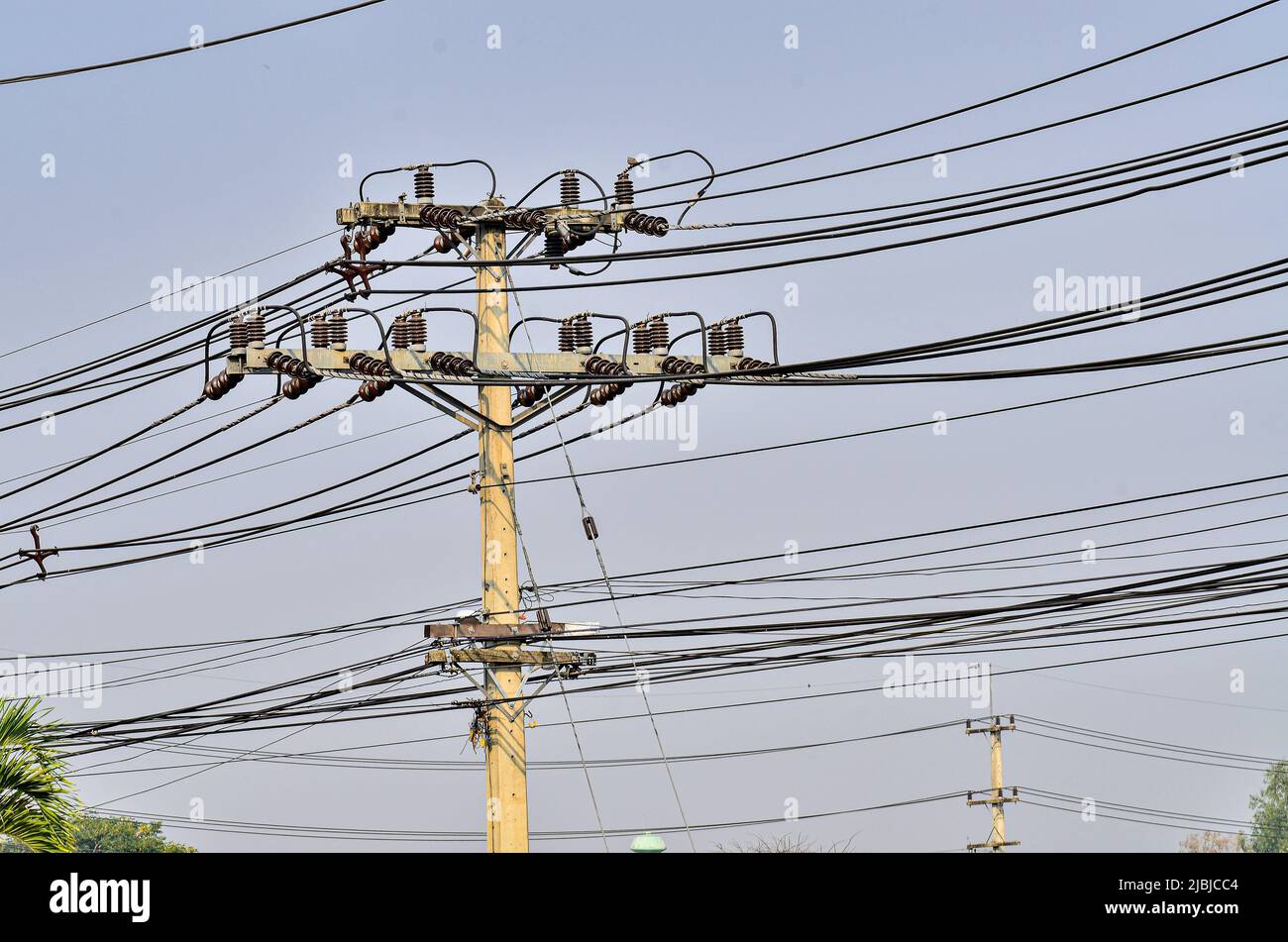 Electric poles and wires in my town Stock Photo