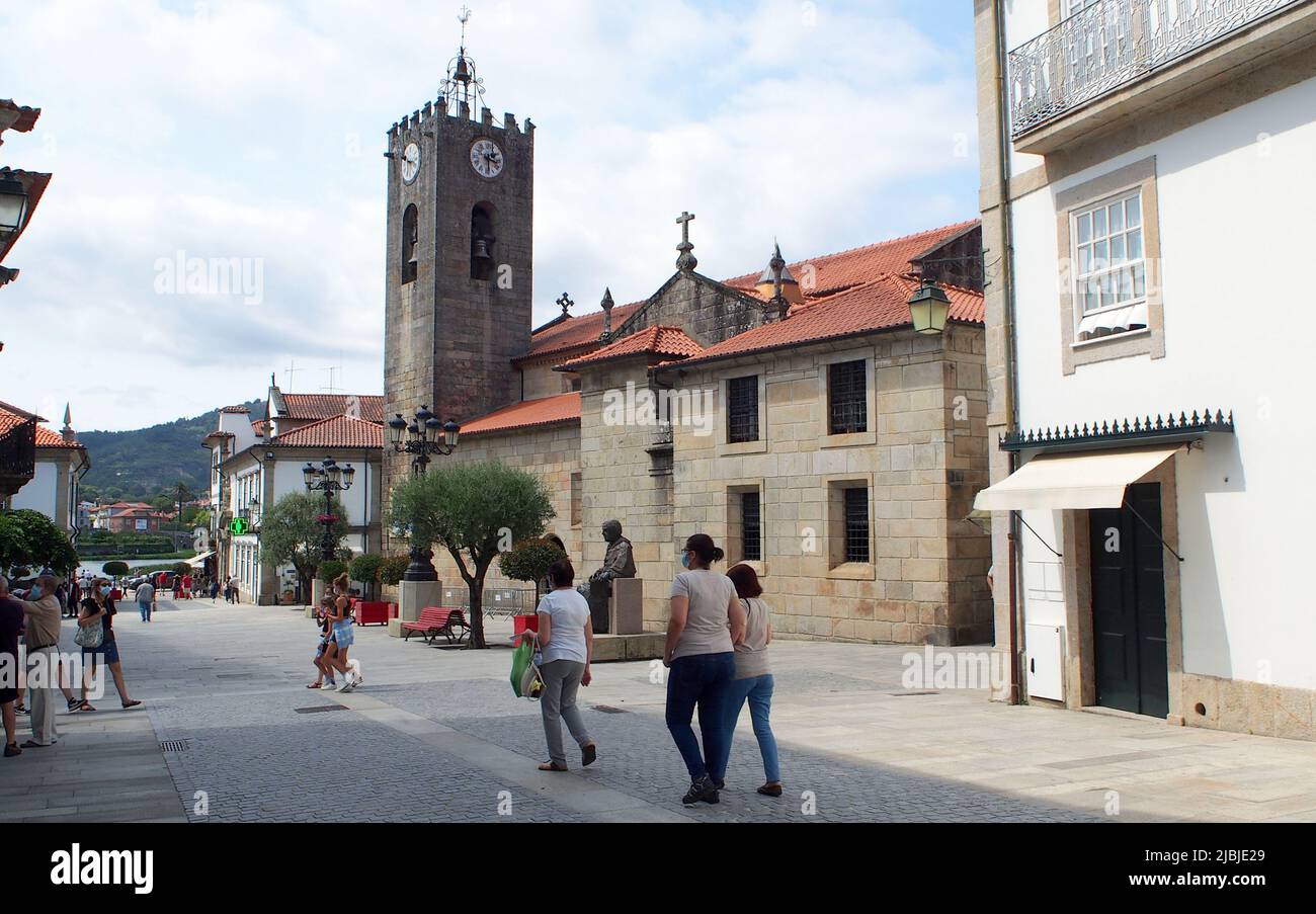 Street scene in the old town, R. Cardeal Saraiva, with medieval Misericordia Church, descent to the Lima River, Ponte de Lima, Portugal Stock Photo