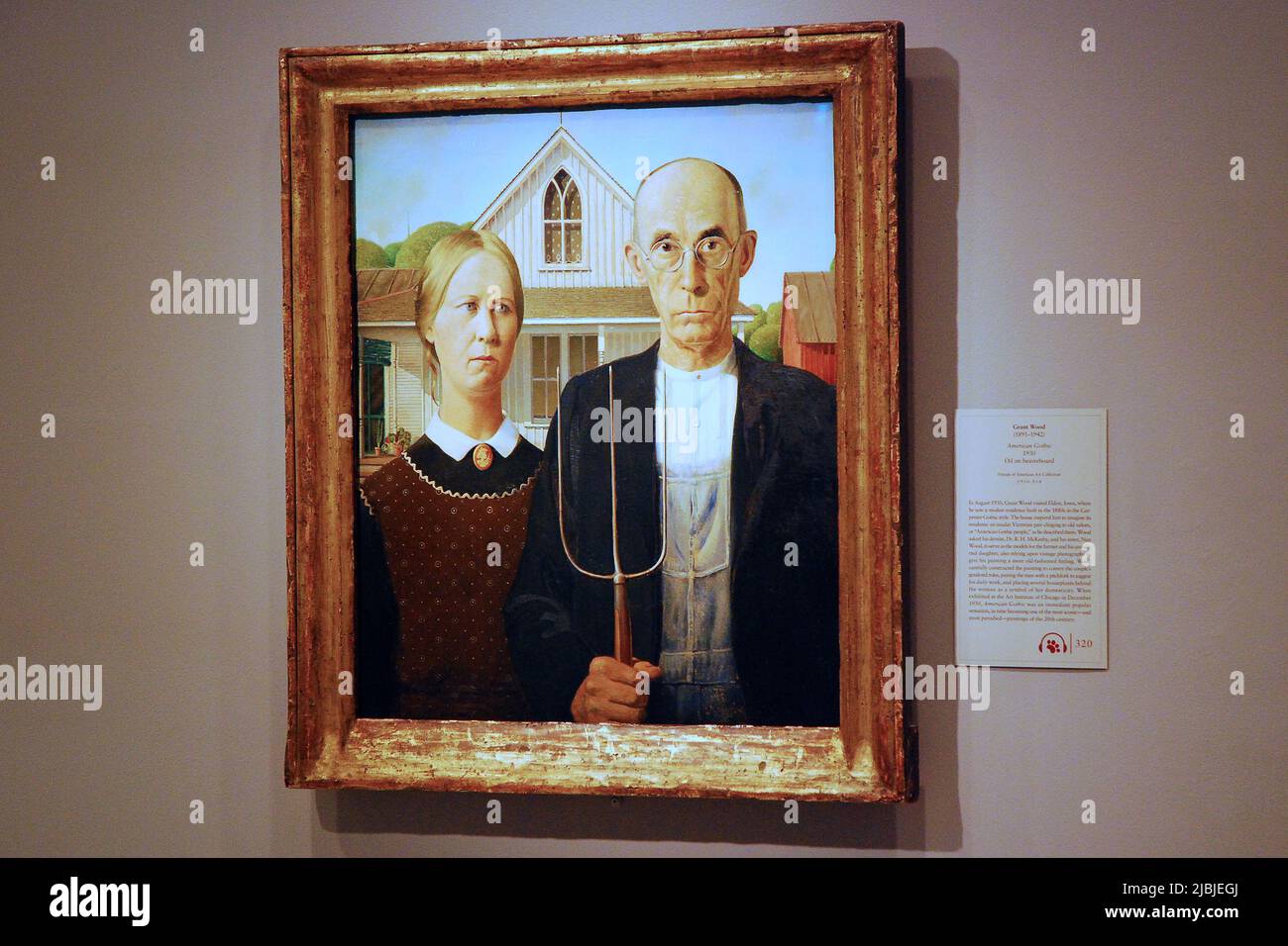 The classic painting, American Gothic, one of the most recognizable art works, hangs in the Chicago Art Institute Stock Photo