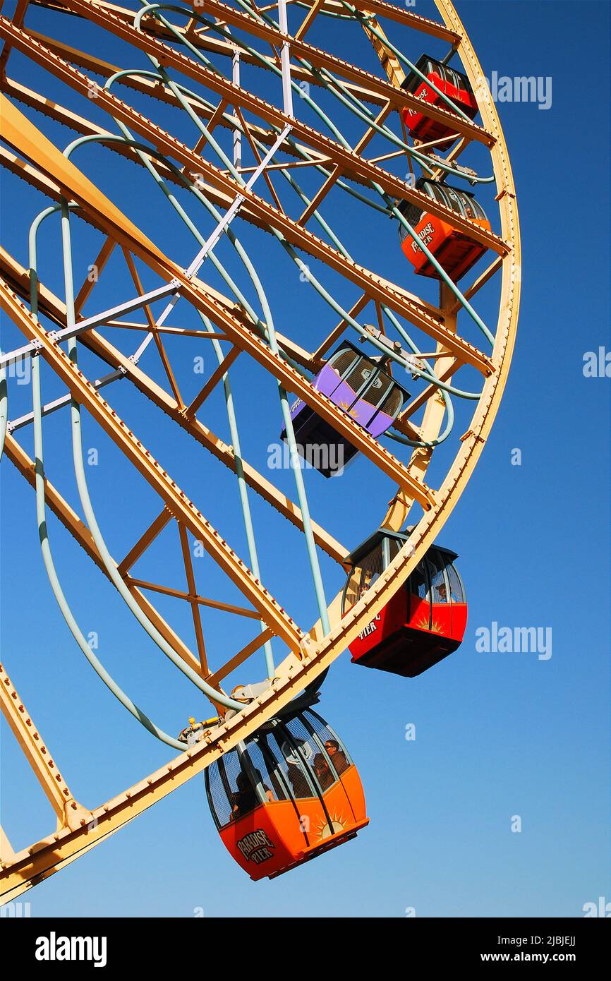 A Ferris wheel climbs to the sky at California Adventure near Disneyland Stock Photo
