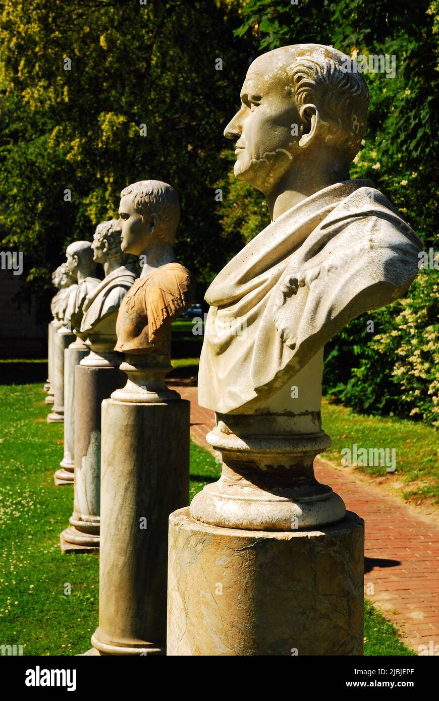 A row of Roman busts line a small courtyard at a museum in Southampton, in the Hamptons on Long Island, New York Stock Photo