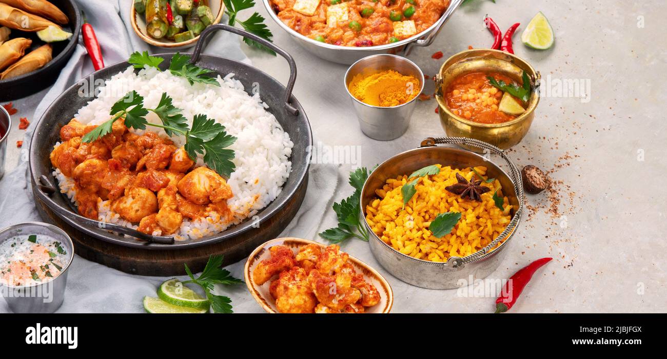 Indian food assortment on light background. Traditional food concept. Dishes and appetisers of indeed cuisine. copy space Stock Photo