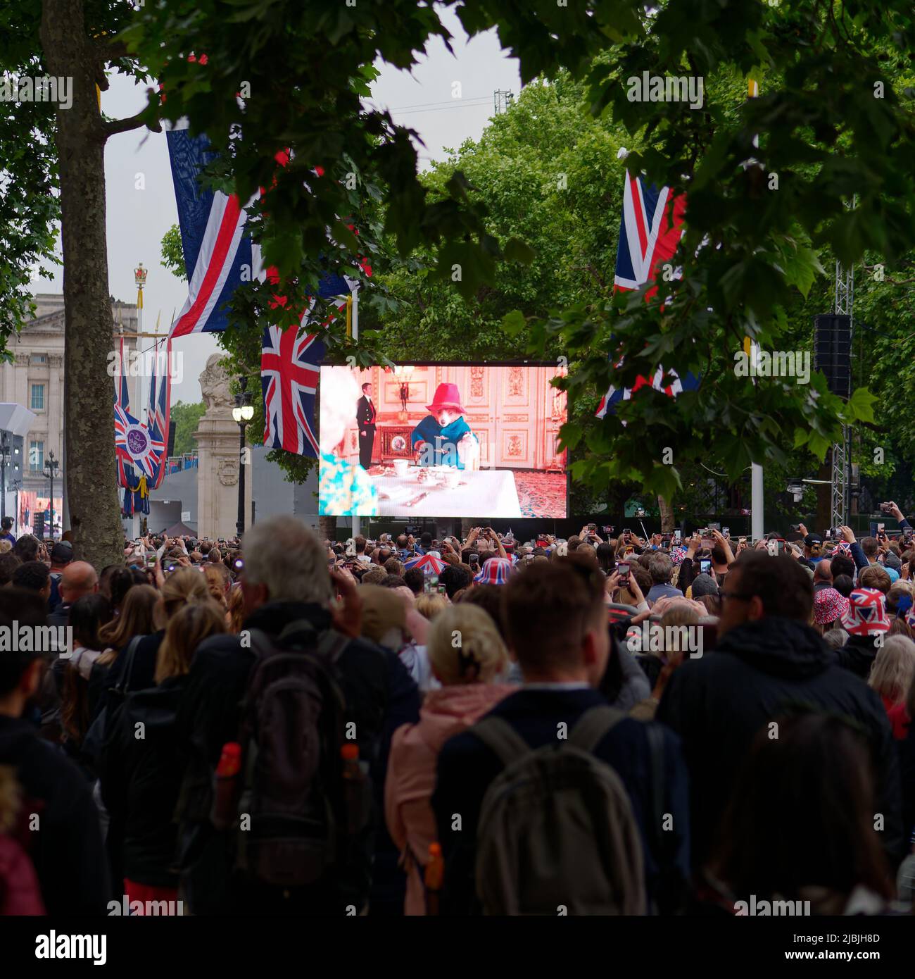 London, Greater London, England, June 04 2022: Jubilee Concert at The Mall. Paddington Bear appears on screen during a sketch with the Queen. Stock Photo