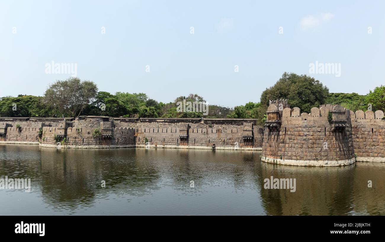 Vellore Fort walls  and moat.  Fort was built by Chinna Bommi Reddy and Thimma Reddy Nayak in 16th Century under the Vijayanagar Empire, Vellore, Tami Stock Photo
