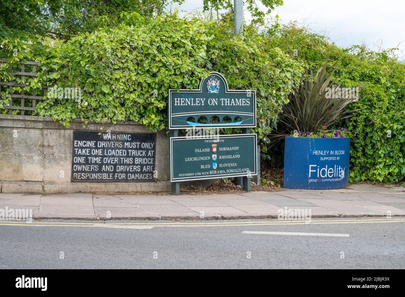 Various signs on the southside approach to Henley Bridge and the town of Henley on Thames, Oxfordshire, England, UK. Stock Photo