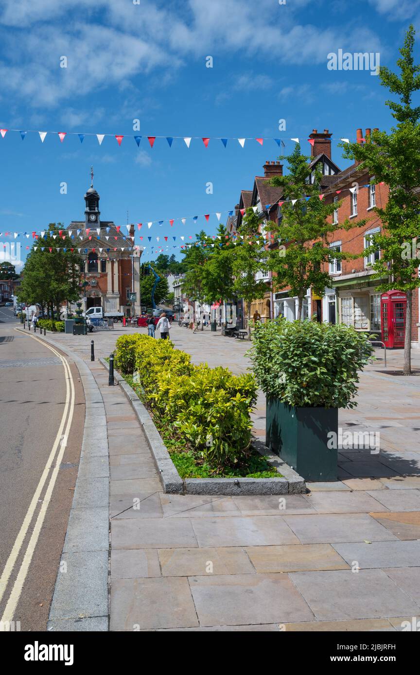 People out and about on a sunny summer day in Market Place, a picturesque part of Henley on Thames, Oxfordshire, England, UK. Stock Photo