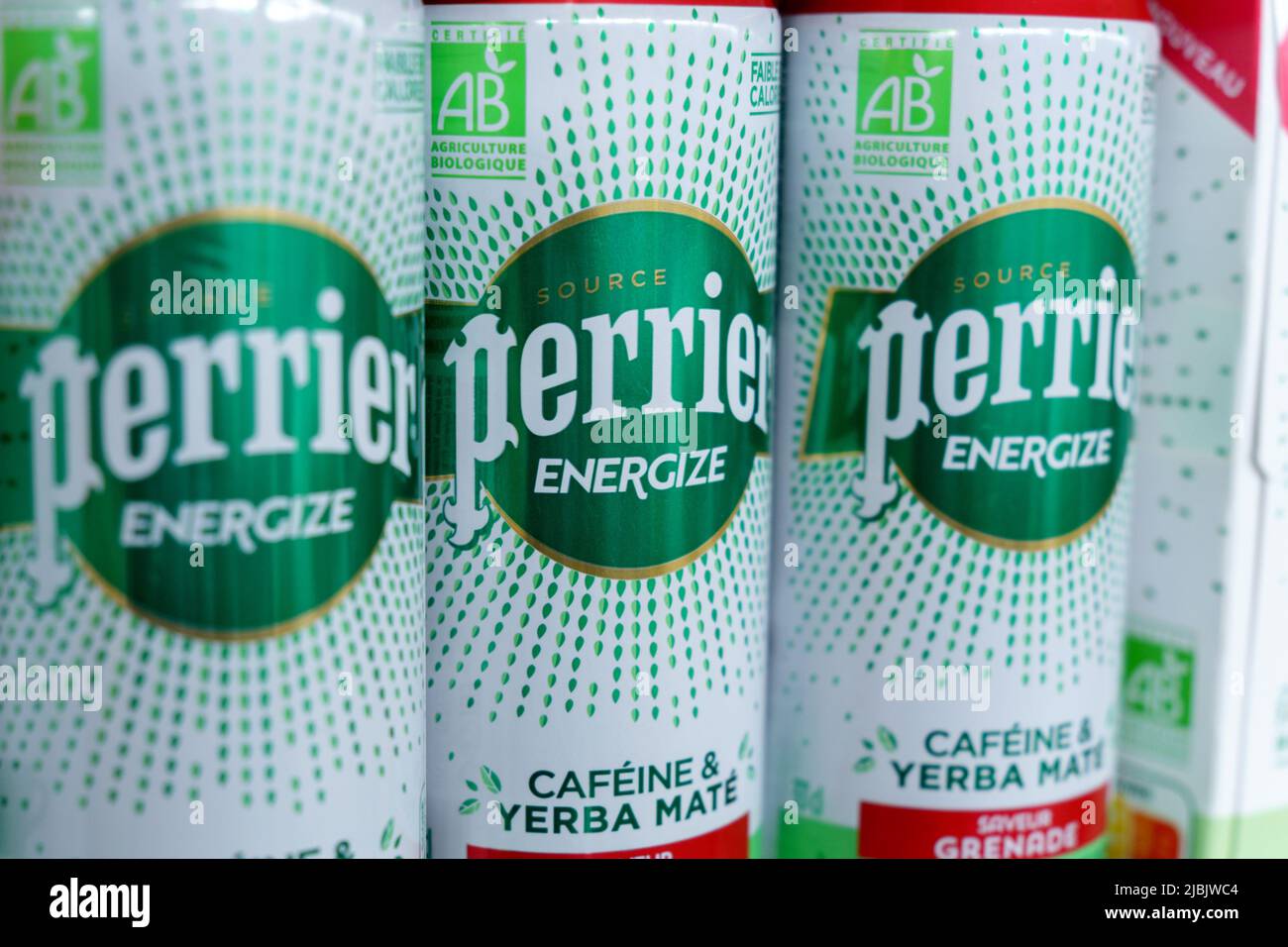 Tyumen, Russia-May 11, 2022: Mineral water bottles Perrier energize cofeine yerba mate. French brand of premium mineral water. Selling in the hypermar Stock Photo