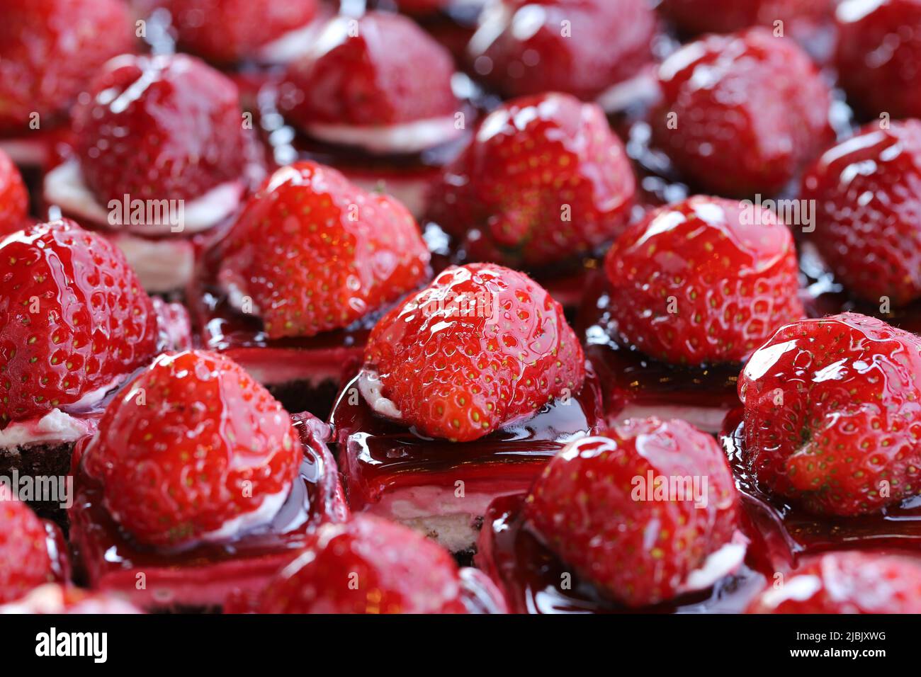 Strawberry small cake slices. close up Stock Photo - Alamy