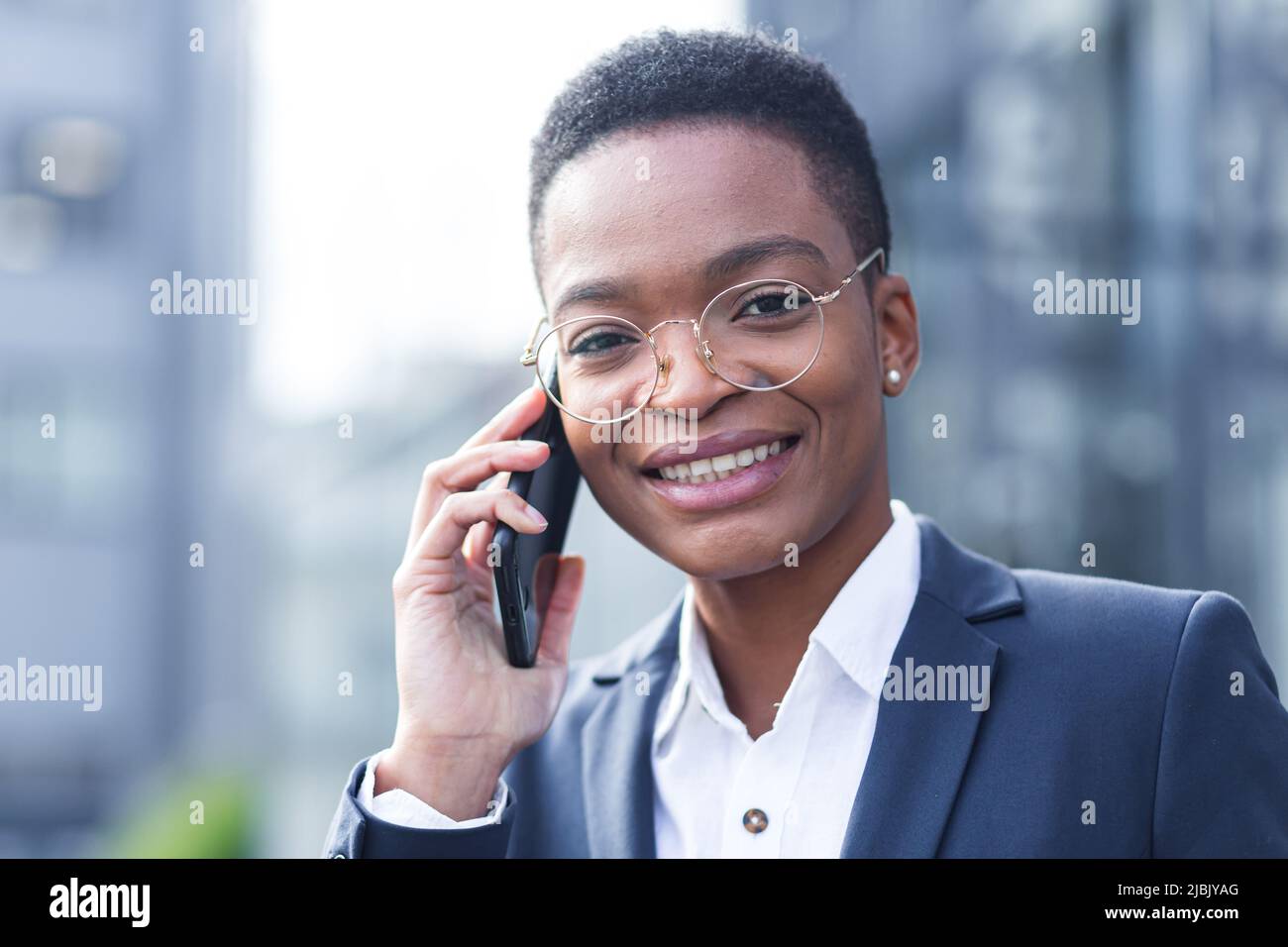 Close-up photo portrait of a young business woman, African American ...