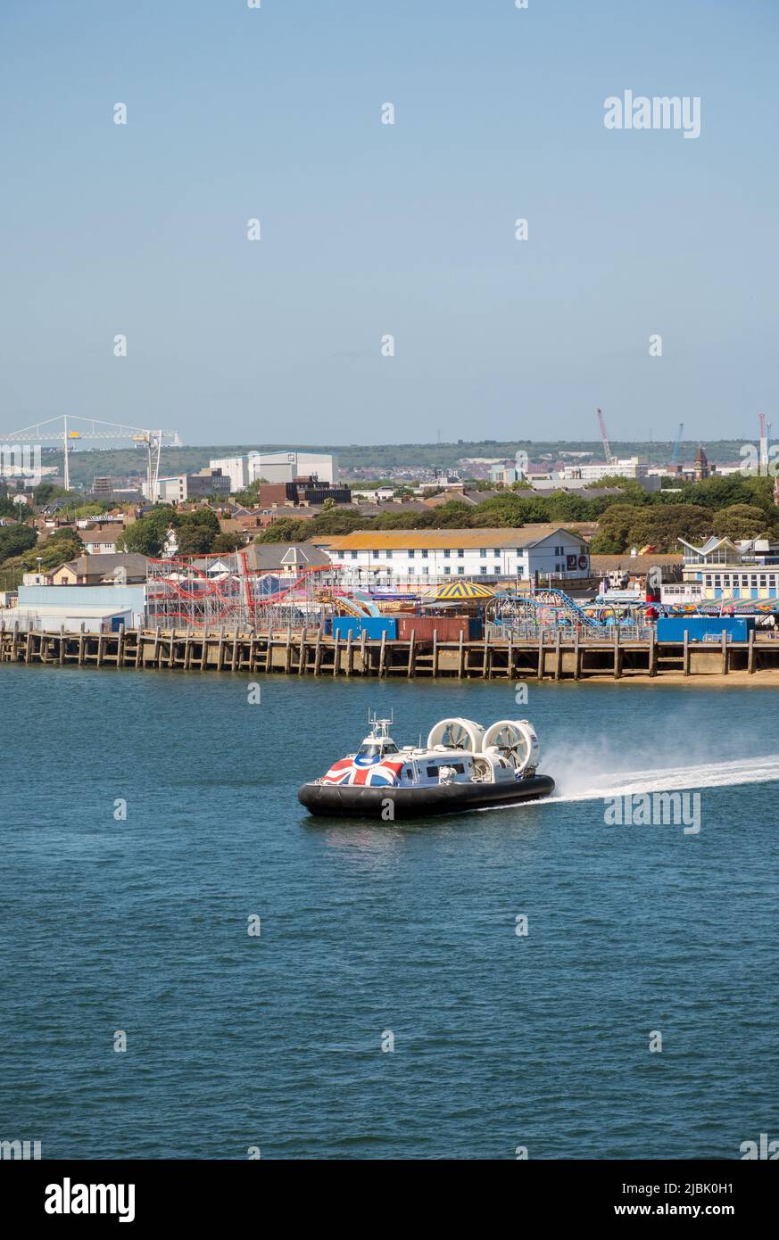 UK, England, Portsmouth. Hovertravel 12000TDs hovercraft leaving the beach at Portsmouth going to Ryde on The Isle of White. Stock Photo