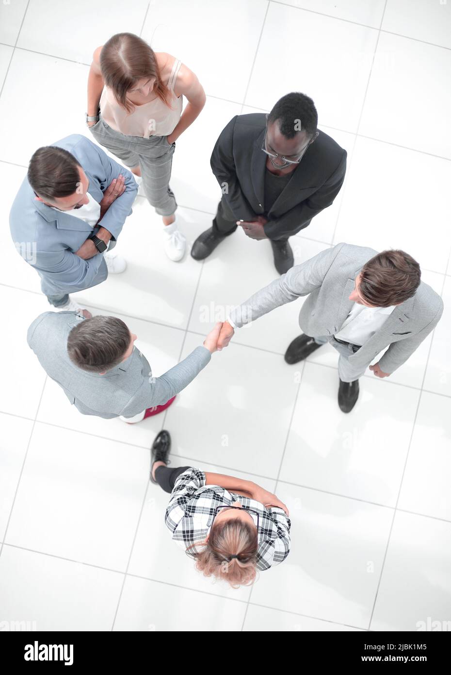 Aerial meeting table handshake hi-res stock photography and images - Alamy