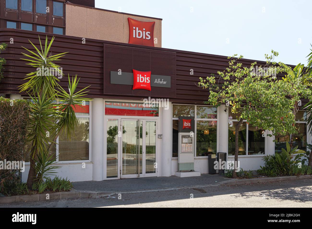 ALFAFAR, SPAIN - JUNE 06, 2022: Ibis is a French brand of economy hotels owned by Accor Stock Photo