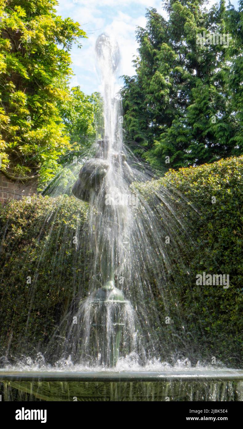 Gawsworth Hall historic working cherub fountain Stock Photo - Alamy