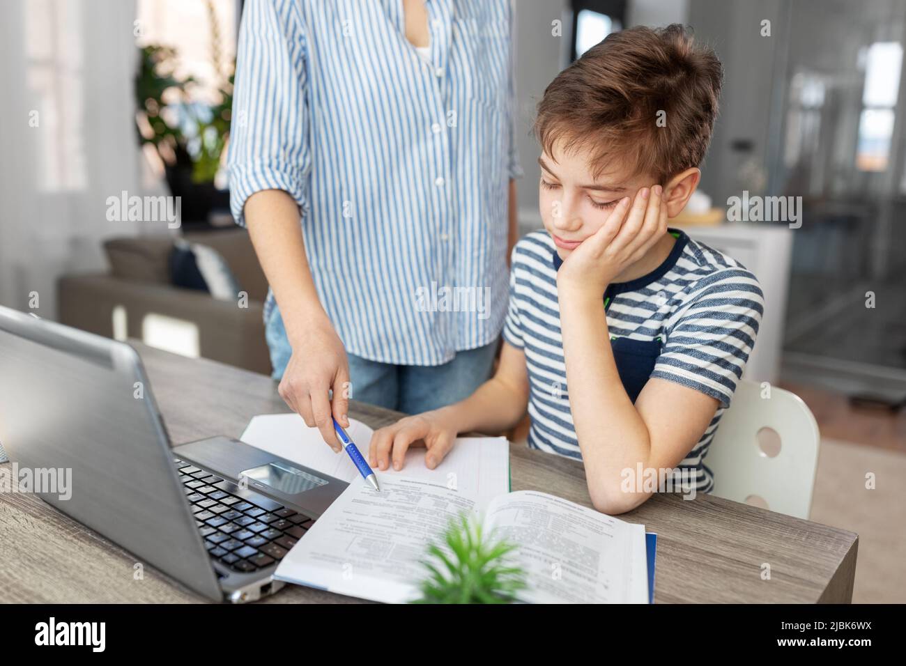 mother and son doing homework together Stock Photo - Alamy