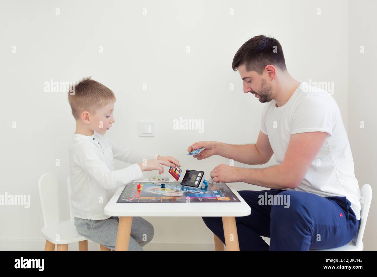 Two boys play board game hi-res stock photography and images - Alamy