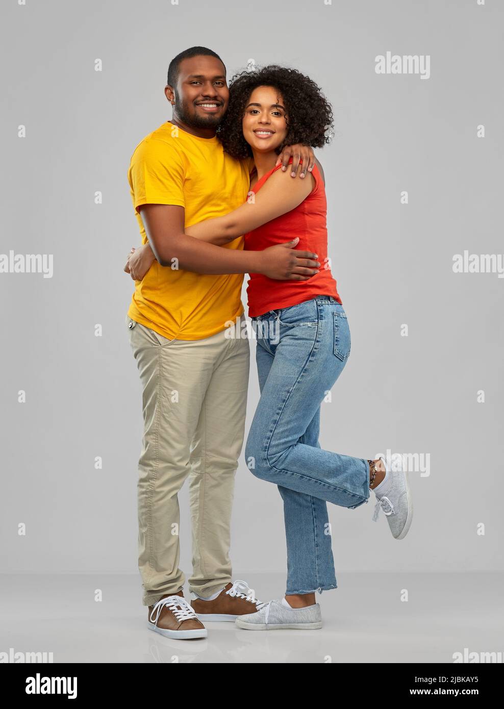 happy african american couple hugging Stock Photo - Alamy