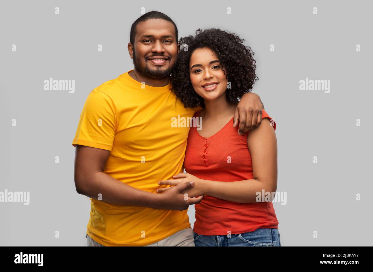 happy african american couple hugging Stock Photo - Alamy